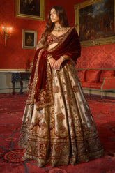 Golden Heavy Worked Lehenga in Banarasi Silk with Velvet Patch Work